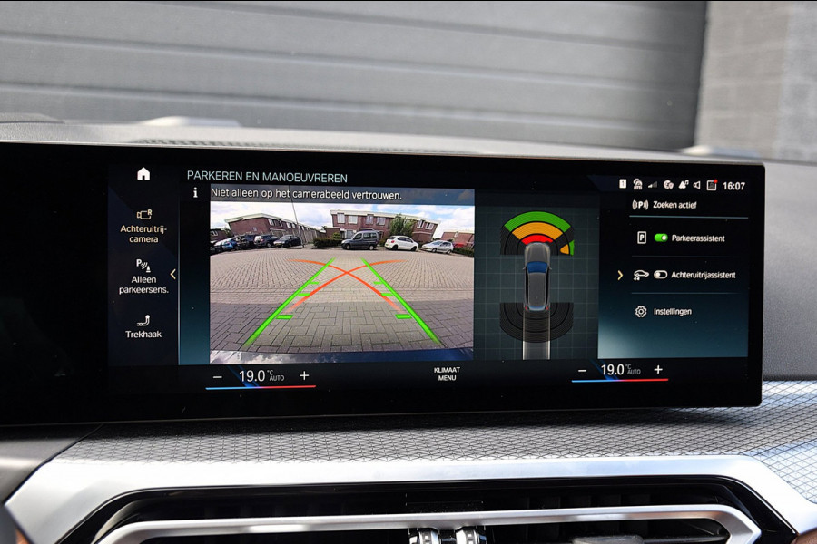 BMW 3 Serie Touring 330e*M-Pakket*Dak*Trekhaak*142Dkm*Keyless*2023*Dravit Grau*INDIVIDUAL*
