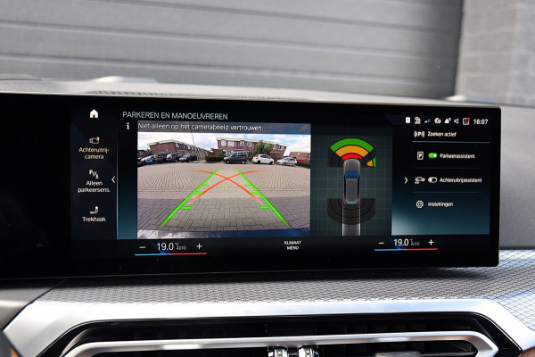 BMW 3 Serie Touring 330e*M-Pakket*Dak*Trekhaak*142Dkm*Keyless*2023*Dravit Grau*INDIVIDUAL*