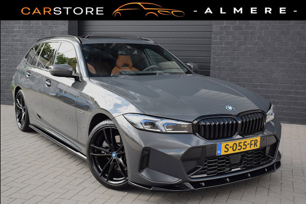 BMW 3 Serie Touring 330e*M-Pakket*Dak*Trekhaak*142Dkm*Keyless*2023*Dravit Grau*INDIVIDUAL*