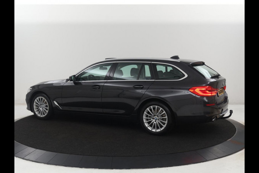 BMW 5 Serie Touring 520i High Executive | Panoramadak | Trekhaak | Head-Up | Stoelventilatie | Stoel & Stuurverwarming | Adaptive cruise | Navigatie | DAB+ | Carplay | Sfeerverlichting | Park assist | Climate control