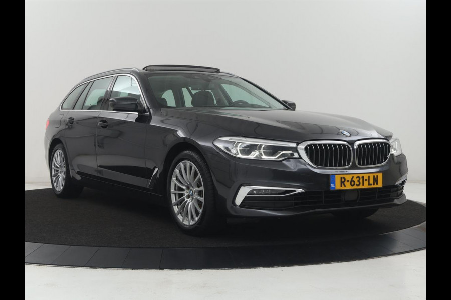 BMW 5 Serie Touring 520i High Executive | Panoramadak | Trekhaak | Head-Up | Stoelventilatie | Stoel & Stuurverwarming | Adaptive cruise | Navigatie | DAB+ | Carplay | Sfeerverlichting | Park assist | Climate control