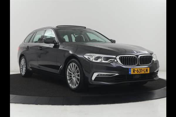 BMW 5 Serie Touring 520i High Executive | Panoramadak | Trekhaak | Head-Up | Stoelventilatie | Stoel & Stuurverwarming | Adaptive cruise | Navigatie | DAB+ | Carplay | Sfeerverlichting | Park assist | Climate control