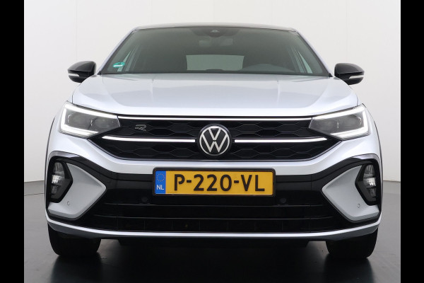 Volkswagen Taigo 1.0TSI Automaat R-Line Panoramadak Camera Adap.Cruise Trekhaak Stoelverwarming Apple Carplay Android Auto Navi Ecc Draadloze telefoonlader Keyless Lmv DAB Bluetooth IQ Light Pdc Isofix Privacy Glas Led Rijstrooksensor 1100KG Trekgewicht
