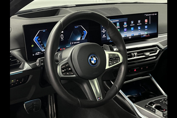 BMW 3-serie 330e M Sport | Open dak | Adapt. cruise | Trekhaak | Head-up | Stoelverwarming | Sfeerverlichting | Carplay | Leder