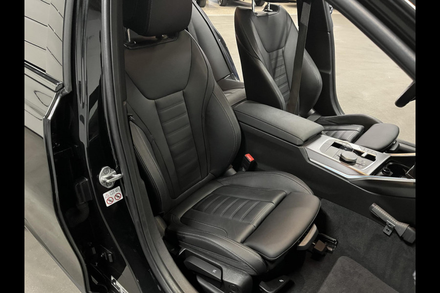 BMW 3-serie 330e M Sport | Open dak | Adapt. cruise | Trekhaak | Head-up | Stoelverwarming | Sfeerverlichting | Carplay | Leder