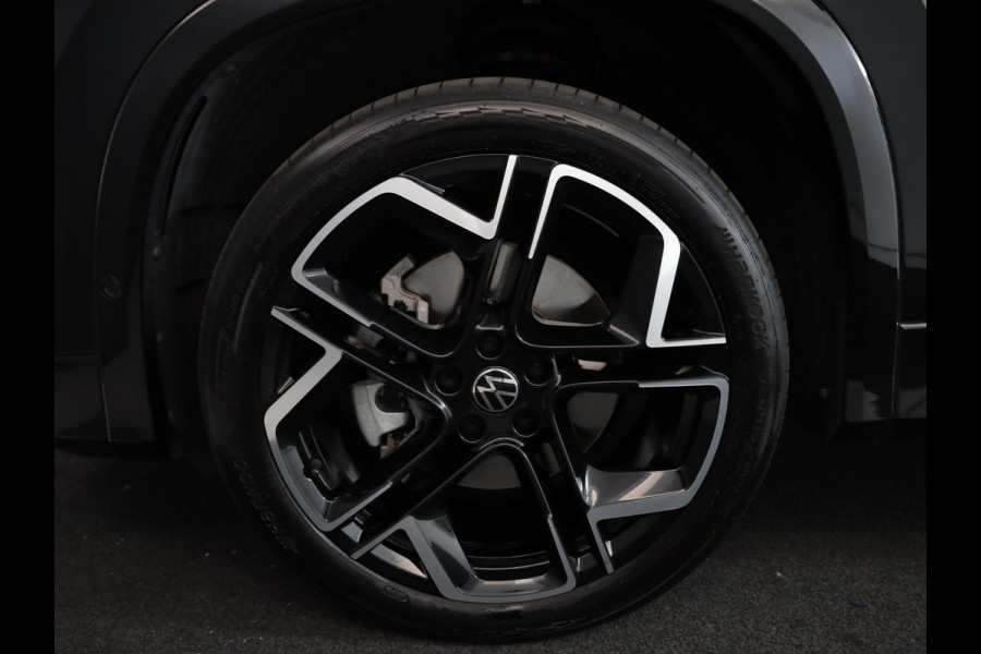 Volkswagen Tayron 1.5 eHybrid R-Line Edition 204 pk Automaat (DSG) | Verlengde garantie | Navigatie | Panoramadak | Trekhaak (wegklapbaar) | Parkeersensoren (Park assist) | Rondomzicht camera | Black Style pakket | R-Line |