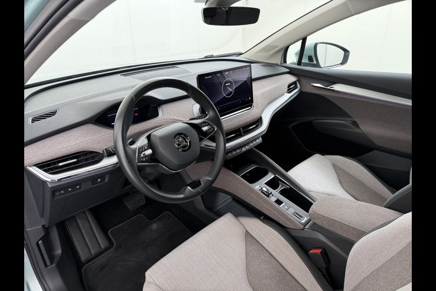 Škoda ENYAQ iV 60 First Edition SOH 92% 3-Zone Ecc Adap.Cruise Stoel+Stuurverwarming Elek.Stoel+Memory Camera Apple Camera Android Auto Navi Pd Keyless advanced Led Matrix Blind Spot Warning Lmv Privacy Glas Lane Assist DAB P-Assist GSM Draadloos laden Dealeronderhouden Origineel Nederlandse Auto