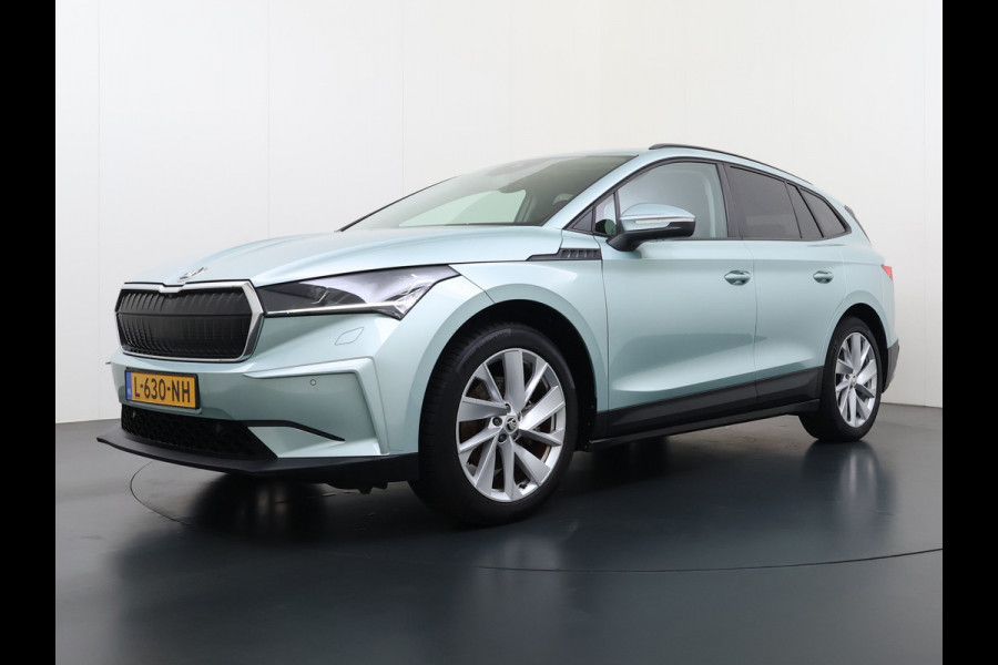 Škoda ENYAQ iV 60 First Edition SOH 92% 3-Zone Ecc Adap.Cruise Stoel+Stuurverwarming Elek.Stoel+Memory Camera Apple Camera Android Auto Navi Pd Keyless advanced Led Matrix Blind Spot Warning Lmv Privacy Glas Lane Assist DAB P-Assist GSM Draadloos laden Dealeronderhouden Origineel Nederlandse Auto