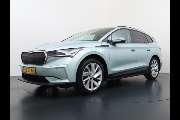 Škoda ENYAQ iV 60 First Edition SOH 92% 3-Zone Ecc Adap.Cruise Stoel+Stuurverwarming Elek.Stoel+Memory Camera Apple Camera Android Auto Navi Pd Keyless advanced Led Matrix Blind Spot Warning Lmv Privacy Glas Lane Assist DAB P-Assist GSM Draadloos laden Dealeronderhouden Origineel Nederlandse Auto