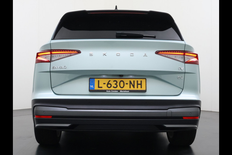 Škoda ENYAQ iV 60 First Edition SOH 92% 3-Zone Ecc Adap.Cruise Stoel+Stuurverwarming Elek.Stoel+Memory Camera Apple Camera Android Auto Navi Pd Keyless advanced Led Matrix Blind Spot Warning Lmv Privacy Glas Lane Assist DAB P-Assist GSM Draadloos laden Dealeronderhouden Origineel Nederlandse Auto