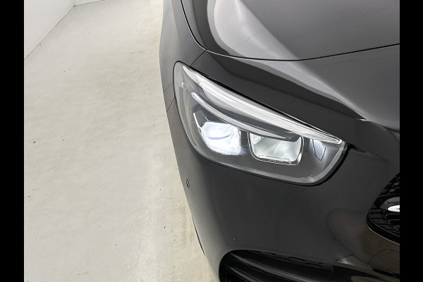 Mercedes-Benz B-Klasse 250 e AMG Plug-In Hybride LIchtmetalen velgen | navigatie | MBUX wide screen| Sfeerverlichting | Night Pakket | Neerklapbare ach Inclusief 24 maanden MB Certified garantie voor Europa.