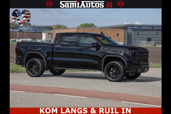 GMC Sierra AT4 6.2 V8 4X4 | VIRTUAL COCKPIT | LPG | HUD | BOM VOL | DC | RAM DEALER NEDERLAND | Dubbele Cabine met Royale 5 Zitplaatsen | BPM vrij | Nu Leverbaar uit Voorraad | Voorraad Nr 261530 | | De specialist in Amerikaanse pick‑ups in Nederland en Europa.