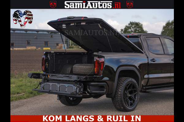 GMC Sierra AT4 6.2 V8 4X4 | VIRTUAL COCKPIT | LPG | HUD | BOM VOL | DC | RAM DEALER NEDERLAND | Dubbele Cabine met Royale 5 Zitplaatsen | BPM vrij | Nu Leverbaar uit Voorraad | Voorraad Nr 261530 | | De specialist in Amerikaanse pick‑ups in Nederland en Europa.