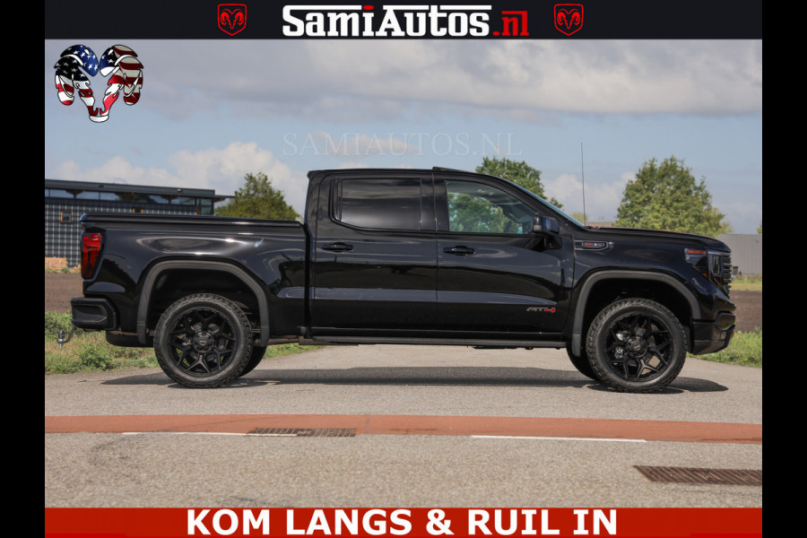 GMC Sierra AT4 6.2 V8 4X4 | VIRTUAL COCKPIT | LPG | HUD | BOM VOL | DC | RAM DEALER NEDERLAND | Dubbele Cabine met Royale 5 Zitplaatsen | BPM vrij | Nu Leverbaar uit Voorraad | Voorraad Nr 261530 | | De specialist in Amerikaanse pick‑ups in Nederland en Europa.