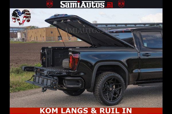GMC Sierra AT4 6.2 V8 4X4 | VIRTUAL COCKPIT | LPG | HUD | BOM VOL | DC | RAM DEALER NEDERLAND | Dubbele Cabine met Royale 5 Zitplaatsen | BPM vrij | Nu Leverbaar uit Voorraad | Voorraad Nr 261530 | | De specialist in Amerikaanse pick‑ups in Nederland en Europa.