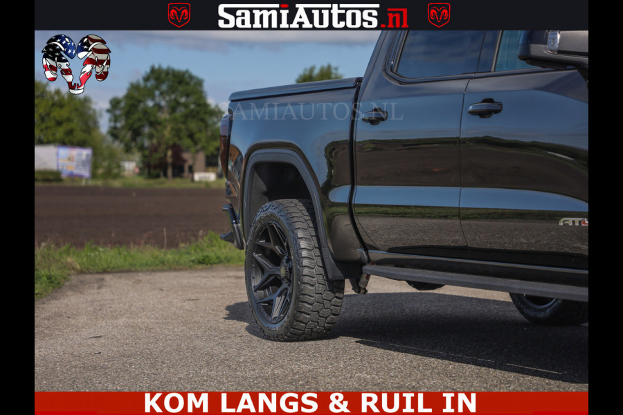 GMC Sierra AT4 6.2 V8 4X4 | VIRTUAL COCKPIT | LPG | HUD | BOM VOL | DC | RAM DEALER NEDERLAND | Dubbele Cabine met Royale 5 Zitplaatsen | BPM vrij | Nu Leverbaar uit Voorraad | Voorraad Nr 261530 | | De specialist in Amerikaanse pick‑ups in Nederland en Europa.