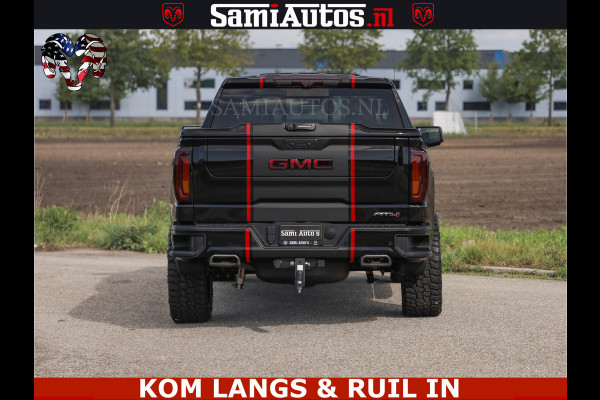 GMC Sierra AT4 6.2 V8 4X4 | VIRTUAL COCKPIT | LPG | HUD | BOM VOL | DC | RAM DEALER NEDERLAND | Dubbele Cabine met Royale 5 Zitplaatsen | BPM vrij | Nu Leverbaar uit Voorraad | Voorraad Nr 261530 | | De specialist in Amerikaanse pick‑ups in Nederland en Europa.