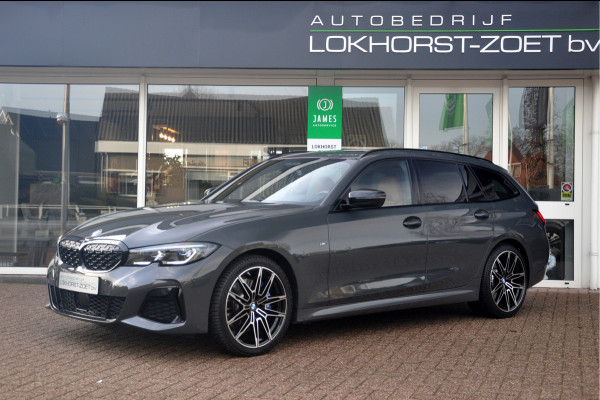 BMW 3 Serie Touring M340i xDrive | Dravit Grau | Panoramadak | Laser | Premium Selection garantie t/m 09/2027