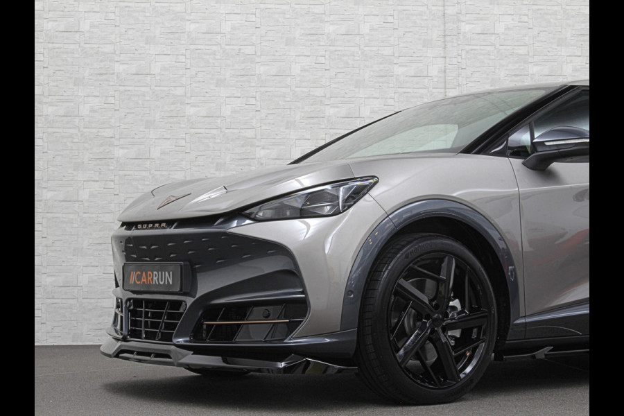 CUPRA Tavascan 77 kWh Aero-pack | Nieuw! | Winter-Pack | Warmtepomp | Verlengde Fabrieksgarantie | 7x Op Voorraad | Adaptive Cruise Control | 3-Zone Clima | Verwarmde Voorruit | Keyless-Entry | Sfeerverlichting | Stoelverwarming | Carplay | Stuurverwarming | Getint Glas | 19 inch | Lane-Assist | Camera | Draadloos Laden |