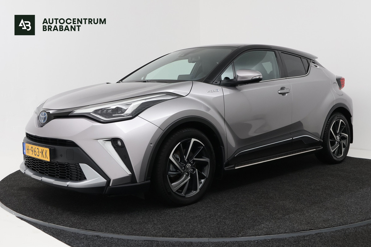 Toyota C-HR 2.0 Hybrid Bi-Tone (SFEERVERLICHTING, STOELVERWARMING, ACHTERUITRIJCAMERA, PARKEERSENSOREN)
