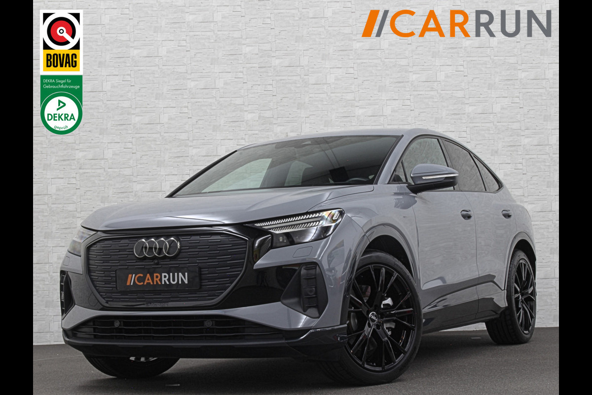 Audi Q4 Sportback e-tron 40 S-Line 77 kWh | Sportstoelen | SOH 98,5 % | H-Leder | ACC | Lane ass. | Virtual + | Black-Optic | Stoelverwarming | Camera | Matrix-Led | Getint Glas | Zwarte Hemelbekleding | MMi+ | 3-Zone Clima | Bovag Garantie |