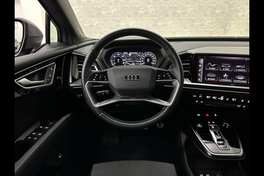 Audi Q4 Sportback e-tron 40 S-Line 77 kWh | Sportstoelen | SOH 98,5 % | H-Leder | ACC | Lane ass. | Virtual + | Black-Optic | Stoelverwarming | Camera | Matrix-Led | Getint Glas | Zwarte Hemelbekleding | MMi+ | 3-Zone Clima | Bovag Garantie |