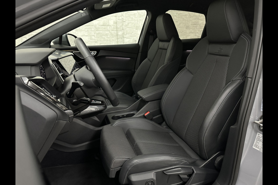 Audi Q4 Sportback e-tron 40 S-Line 77 kWh | Sportstoelen | SOH 98,5 % | H-Leder | ACC | Lane ass. | Virtual + | Black-Optic | Stoelverwarming | Camera | Matrix-Led | Getint Glas | Zwarte Hemelbekleding | MMi+ | 3-Zone Clima | Bovag Garantie |