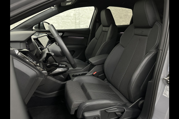 Audi Q4 Sportback e-tron 40 S-Line 77 kWh | Sportstoelen | SOH 98,5 % | H-Leder | ACC | Lane ass. | Virtual + | Black-Optic | Stoelverwarming | Camera | Matrix-Led | Getint Glas | Zwarte Hemelbekleding | MMi+ | 3-Zone Clima | Bovag Garantie |