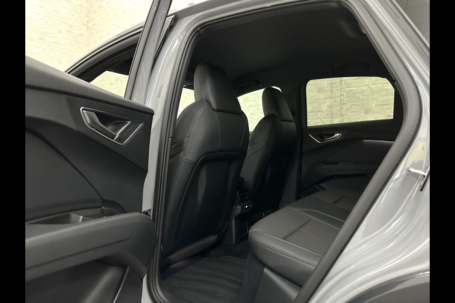 Audi Q4 Sportback e-tron 40 S-Line 77 kWh | Sportstoelen | SOH 98,5 % | H-Leder | ACC | Lane ass. | Virtual + | Black-Optic | Stoelverwarming | Camera | Matrix-Led | Getint Glas | Zwarte Hemelbekleding | MMi+ | 3-Zone Clima | Bovag Garantie |