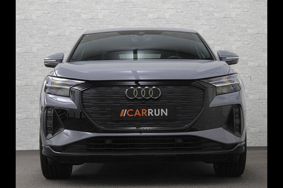 Audi Q4 Sportback e-tron 40 S-Line 77 kWh | Sportstoelen | SOH 98,5 % | H-Leder | ACC | Lane ass. | Virtual + | Black-Optic | Stoelverwarming | Camera | Matrix-Led | Getint Glas | Zwarte Hemelbekleding | MMi+ | 3-Zone Clima | Bovag Garantie |