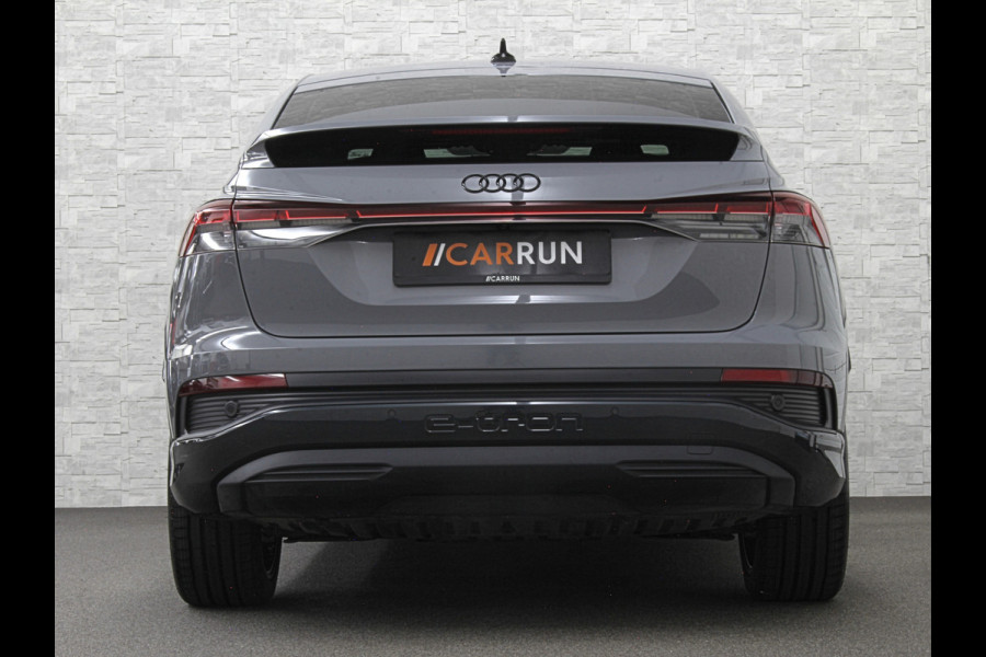 Audi Q4 Sportback e-tron 40 S-Line 77 kWh | Sportstoelen | SOH 98,5 % | H-Leder | ACC | Lane ass. | Virtual + | Black-Optic | Stoelverwarming | Camera | Matrix-Led | Getint Glas | Zwarte Hemelbekleding | MMi+ | 3-Zone Clima | Bovag Garantie |