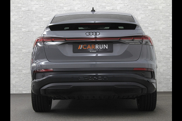 Audi Q4 Sportback e-tron 40 S-Line 77 kWh | Sportstoelen | SOH 98,5 % | H-Leder | ACC | Lane ass. | Virtual + | Black-Optic | Stoelverwarming | Camera | Matrix-Led | Getint Glas | Zwarte Hemelbekleding | MMi+ | 3-Zone Clima | Bovag Garantie |