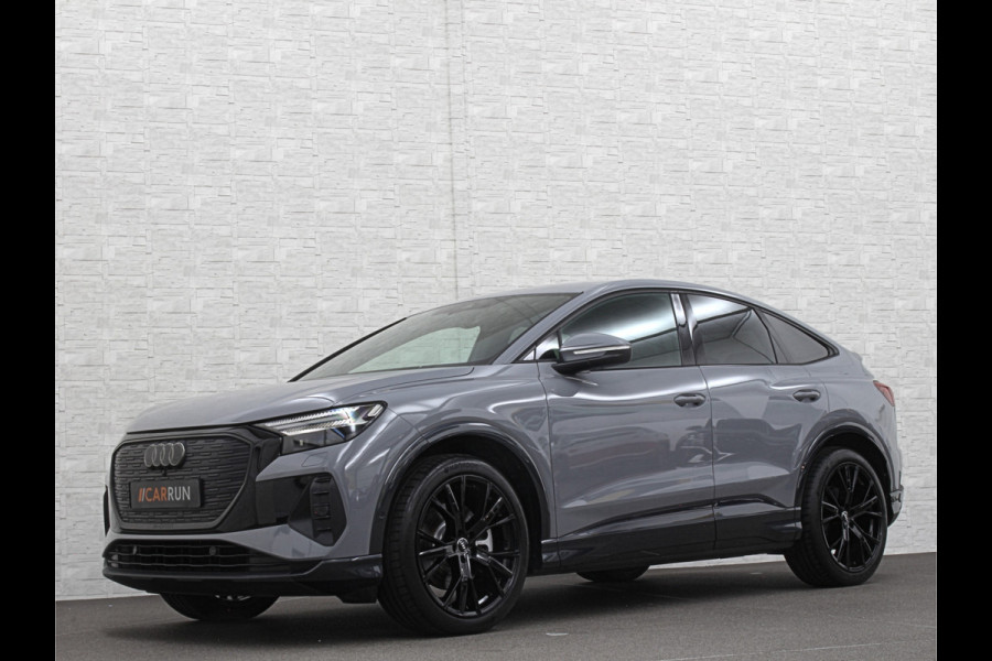 Audi Q4 Sportback e-tron 40 S-Line 77 kWh | Sportstoelen | SOH 98,5 % | H-Leder | ACC | Lane ass. | Virtual + | Black-Optic | Stoelverwarming | Camera | Matrix-Led | Getint Glas | Zwarte Hemelbekleding | MMi+ | 3-Zone Clima | Bovag Garantie |