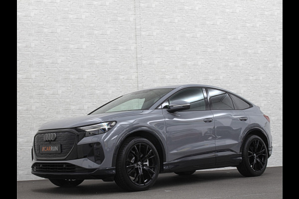 Audi Q4 Sportback e-tron 40 S-Line 77 kWh | Sportstoelen | SOH 98,5 % | H-Leder | ACC | Lane ass. | Virtual + | Black-Optic | Stoelverwarming | Camera | Matrix-Led | Getint Glas | Zwarte Hemelbekleding | MMi+ | 3-Zone Clima | Bovag Garantie |
