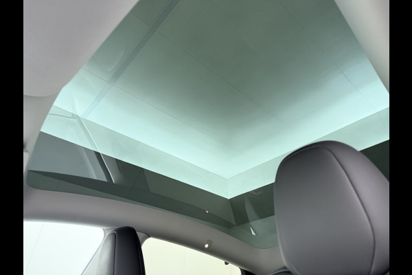 Tesla Model Y RWD 300PK LFP Accu Trekhaak Warmtepomp Leer Navi Ecc Adap.Cruise Panoramadak Camera's SOH 92,5% Stuur+Stoelverwarming Led Traffic-Aware Cruise Control Toybox Elek.Achterklep 1.600KG Trekgewicht 1e Eigenaar Origineel Nederlandse Auto
