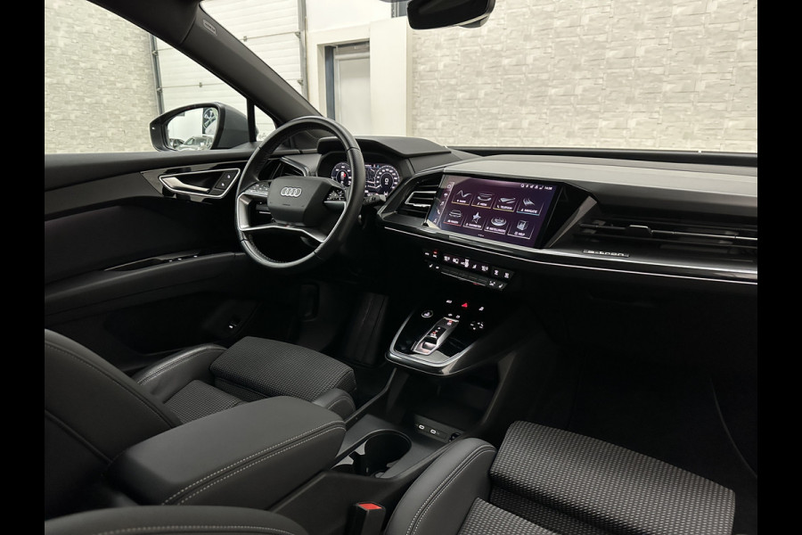 Audi Q4 Sportback e-tron 40 S-Line 77 kWh | Sportstoelen | SOH 98,5 % | H-Leder | ACC | Lane ass. | Virtual + | Black-Optic | Stoelverwarming | Camera | Matrix-Led | Getint Glas | Zwarte Hemelbekleding | MMi+ | 3-Zone Clima | Bovag Garantie |