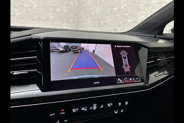 Audi Q4 Sportback e-tron 40 S-Line 77 kWh | Sportstoelen | SOH 98,5 % | H-Leder | ACC | Lane ass. | Virtual + | Black-Optic | Stoelverwarming | Camera | Matrix-Led | Getint Glas | Zwarte Hemelbekleding | MMi+ | 3-Zone Clima | Bovag Garantie |