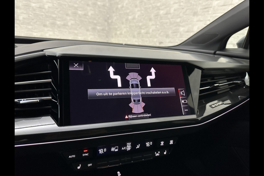 Audi Q4 Sportback e-tron 40 S-Line 77 kWh | Sportstoelen | SOH 98,5 % | H-Leder | ACC | Lane ass. | Virtual + | Black-Optic | Stoelverwarming | Camera | Matrix-Led | Getint Glas | Zwarte Hemelbekleding | MMi+ | 3-Zone Clima | Bovag Garantie |