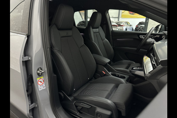 Audi Q4 Sportback e-tron 40 S-Line 77 kWh | Sportstoelen | SOH 98,5 % | H-Leder | ACC | Lane ass. | Virtual + | Black-Optic | Stoelverwarming | Camera | Matrix-Led | Getint Glas | Zwarte Hemelbekleding | MMi+ | 3-Zone Clima | Bovag Garantie |