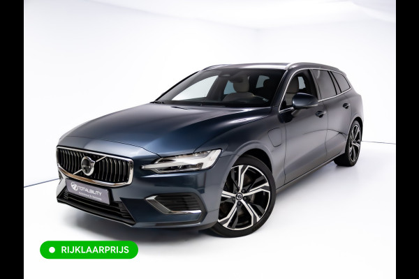 Volvo V60 2.0 T8 Plug-in hybrid AWD Ultimate Bright | Bowers & Wilkins | Panorama dak | Trekhaak | Stoel- Stuur en achterbankverw. | Head-up, Pilot assist, Elec. achterklep, 360 Camera, Electrische stoelen met geheugen