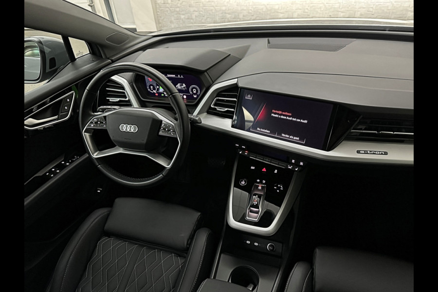 Audi Q4 e-tron 40 204pk 77 kWh | #RS-Leder | 5x Q4 OP VOORRAAD! | ACC | Matrix Led | 3 Zone Clima | Kieselgrau | 2023 | Btw auto, 27150,= ex. | Bovag garantie. 4x Q4 op voorraad!