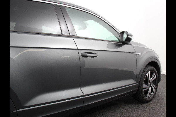 Volkswagen T-Roc 1.5 TSI 150pk Automaat R-Line Plus Navigatie Apple Carplay/Android Auto Camera Parkeersensoren Adaptive Cruise Control Stoelverwarming Virtual Cockpit Elektrische achterklep Getinte ramen Climate Control