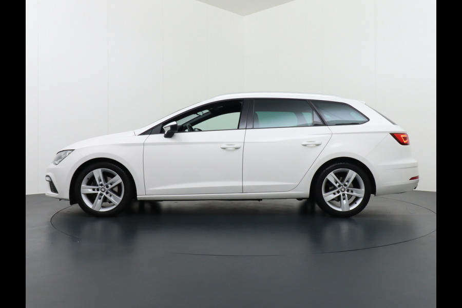 Seat Leon ST 1.5T 131pk FR Trekhaak Stoelverwarming Navi via Apple Carplay/Android Auto Navi Lmv 17" Dual-ECC Privacy Glass DAB Cruise Con Winterpack Sportstoelen Licht+Regensensor Isofix 1.400KG Trekgewicht Origineel Nederlandse Auto