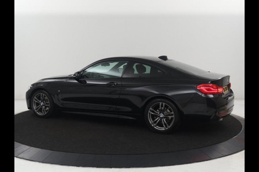BMW 4 Serie Coupé 418i High Executive M-sport | Stoelverwarming | Leder | Cruise control | Park assist | Sfeerverlichting | Climate control | Navigatie |