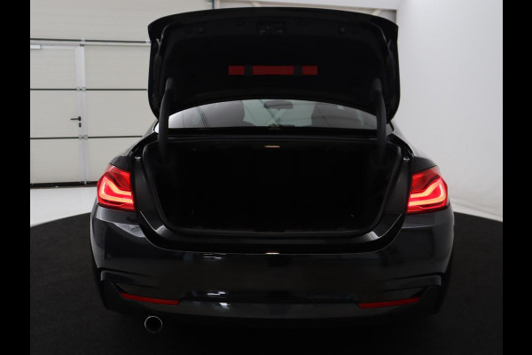 BMW 4 Serie Coupé 418i High Executive M-sport | Stoelverwarming | Leder | Cruise control | Park assist | Sfeerverlichting | Climate control | Navigatie |