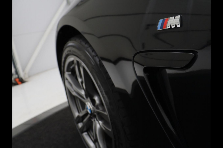 BMW 4 Serie Coupé 418i High Executive M-sport | Stoelverwarming | Leder | Cruise control | Park assist | Sfeerverlichting | Climate control | Navigatie |