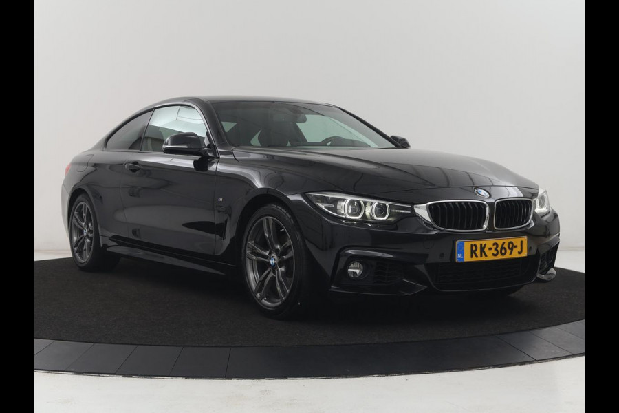 BMW 4 Serie Coupé 418i High Executive M-sport | Stoelverwarming | Leder | Cruise control | Park assist | Sfeerverlichting | Climate control | Navigatie |