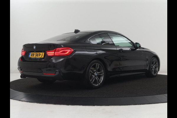 BMW 4 Serie Coupé 418i High Executive M-sport | Stoelverwarming | Leder | Cruise control | Park assist | Sfeerverlichting | Climate control | Navigatie |