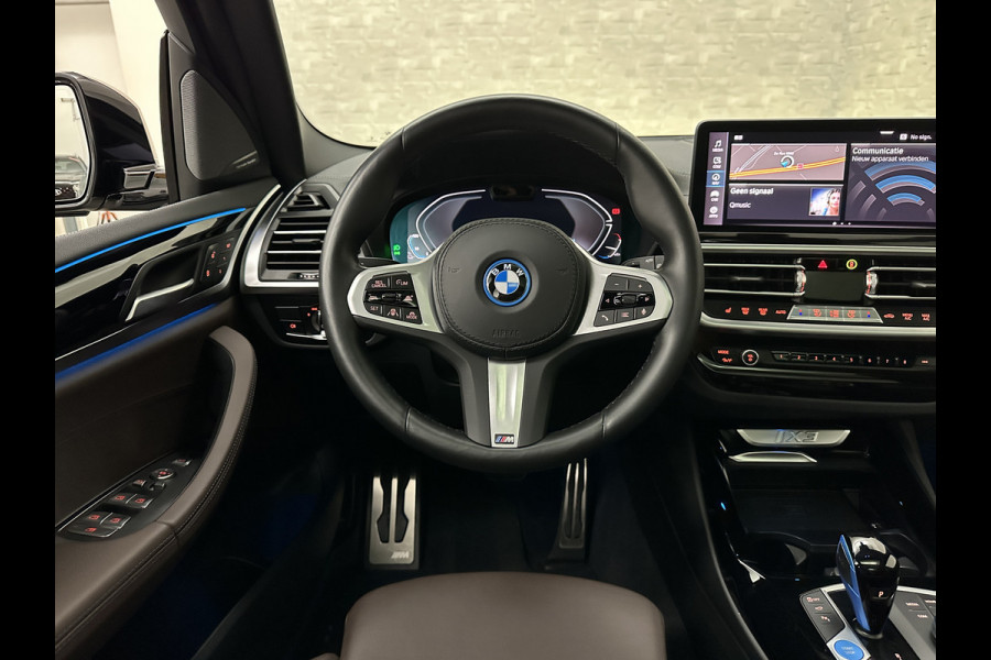 BMW iX3 M-Sport 80 kWh | Panorama | 360 Camera | ACC | Leder | 99% SOH | Head-Up | Keyless-Entry | Harman-Kardon | Memory | Dodehoek | 3-Zone Clima | Sfeerverlichting | Carplay | ISO-Glas | Draadloos Laden | Bovag Garantie |