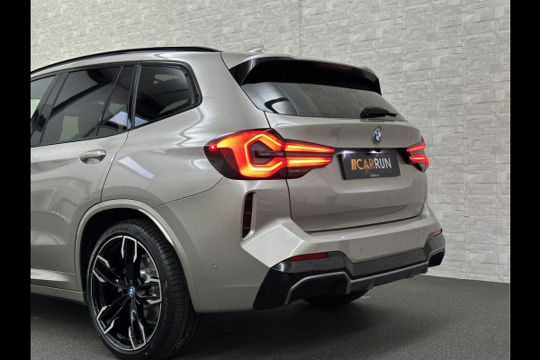 BMW iX3 M-Sport 80 kWh | Panorama | 360 Camera | ACC | Leder | 99% SOH | Head-Up | Keyless-Entry | Harman-Kardon | Memory | Dodehoek | 3-Zone Clima | Sfeerverlichting | Carplay | ISO-Glas | Draadloos Laden | Bovag Garantie |